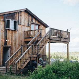 the bathhouse is on the lower level of this barn