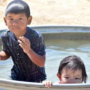 Kids enjoying the trough.