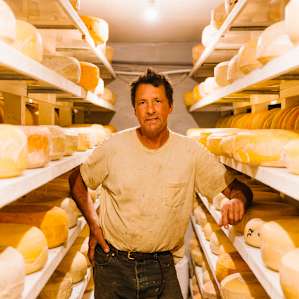 Patrick in his cheese cellar.