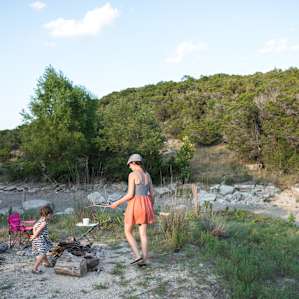 Gathering wood for the fire. You'll find plenty on the land.