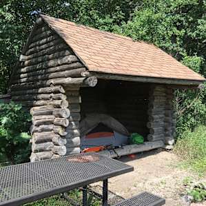 Cabin that u can put your tent in or a table