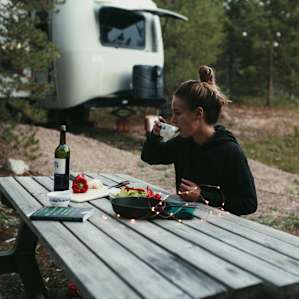 meal prepping for dinner outside on the picnic table
