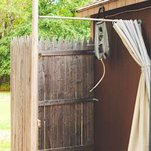They have an outdoor summer shower. You can warm the bag in the sun a bit so it isn't cold when you use it.