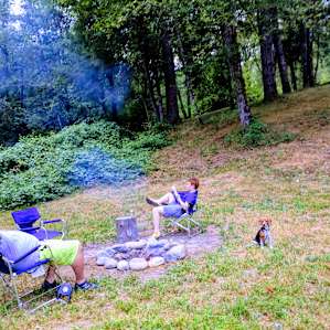 Enjoying an early evening campfire.