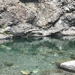 Swimming hole a short walk down to the day use area of the Panther Flat campground. Small beach but pristine waters. Come early for a spot in the sand.