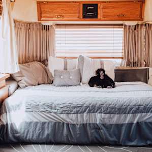 Full bed in the front of the camper.