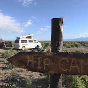 Cute sign plus campervan
