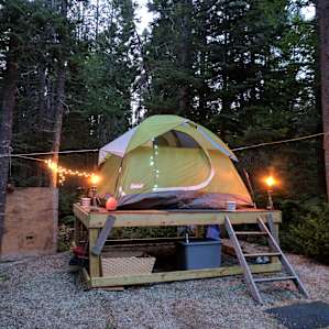 Simple as can be. Wood platform is ready so your tent is flat with zero rocks underneath. Also works great for storing things out of the way.