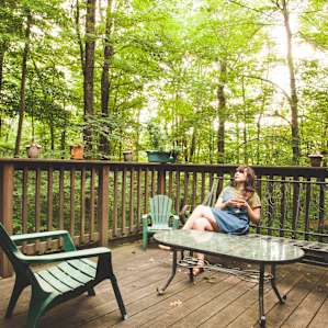 Wine out on the deck. Also- as this picture was being taken, an acorn dropped down right in front of me!