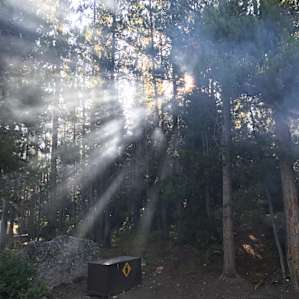 Finding beautiful light in the smoke of our campfire.