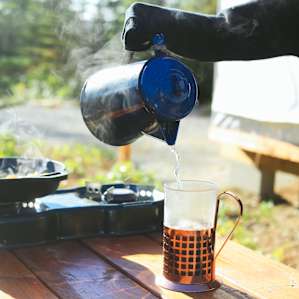 Even though there is a coffee maker provided we had to make some french press in the morning light on the picnic table!