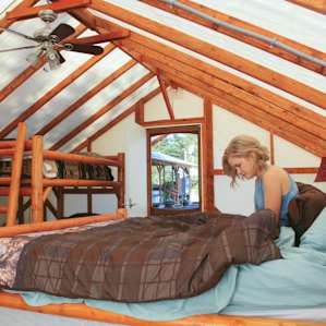 Stay in Cabin 1 and read during the morning light in the KING BED!!