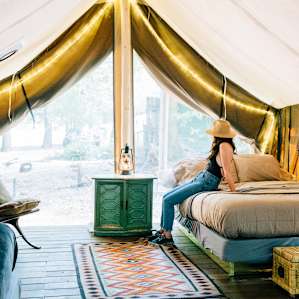 There are two beds inside of the tent, a queen and twin.