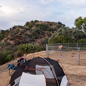 Our campsite and tent setup near the pig pen!