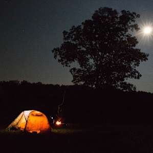 Tent, fire, moon.
