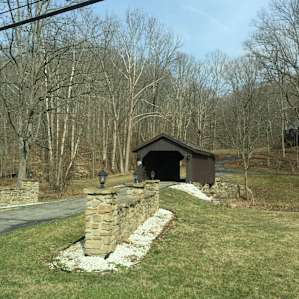 A covered bridge as you enter the park!