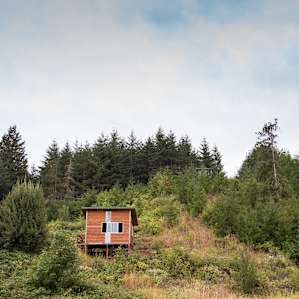 The cabin from the meadow below.