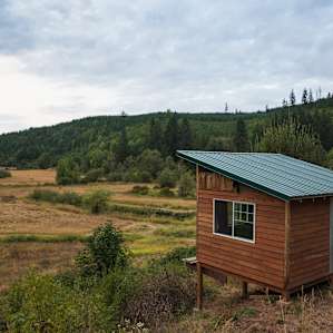 The cabin overlooking the meadow.