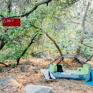 The "Hidden" campsite is easy to spot with the red sign.