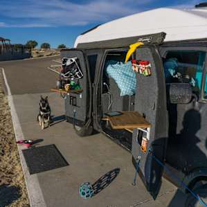 Paved camping with shade.