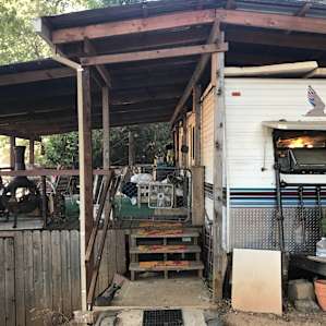 Trailer with big deck attached.