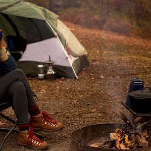 Enjoying coffee by the fire.