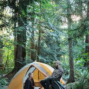 Sharing some stories by the tent.