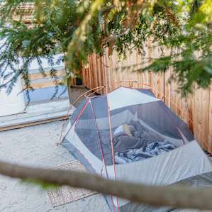 The only place I can think of in this part of the Central Coast where you can camp next to a redwood.