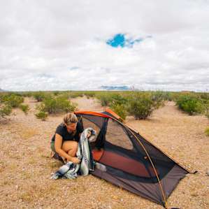 There is vast desert in the middle of a great experimental building community to find a spot for your tent