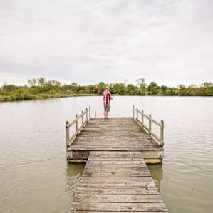 Casting a line off the end of the dock.