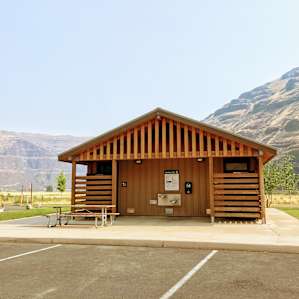 Bathrooms are a short walk from the camp sites.