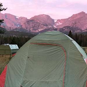 Sunrise alpenglow over the tent.