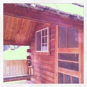 Porch swing at the rustic cabin