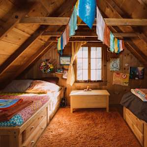Sleeping loft has 2 full-sized beds