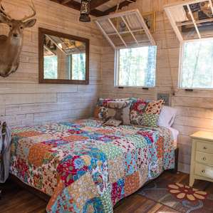 With a comfy bed and windows that open all around it's the perfect place to relax.