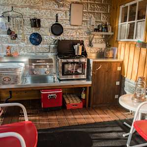 On the deck of the cabin you'll find a kitchen with everything you could need to fix a meal.