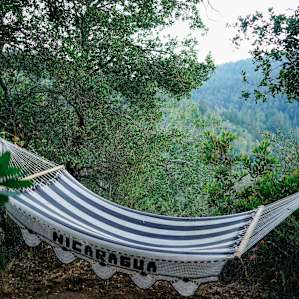 A short 15minute hike will take you to a clearing with a hammock and some chairs to see the sunset/stars