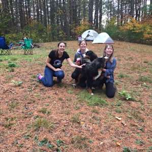 setting up camp with her sweet dogs
