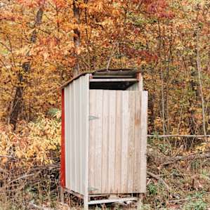 Outhouse with composting toilet.