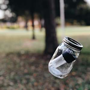 Hanging mason jars with solar lights are all over the property.