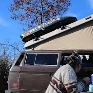 people lodging camper