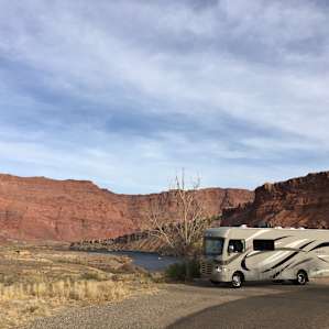 View of our camper and the river. Max 30 ft rigs at this campground