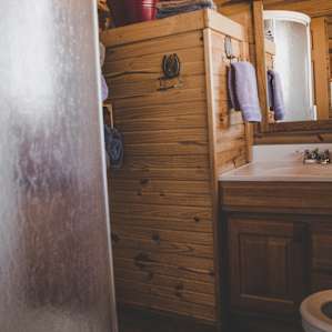Full bath downstairs with running water, toilet and shower.