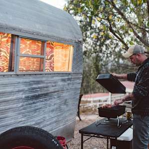 people lodging camper