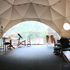 Inside bigger glass dome/yurt