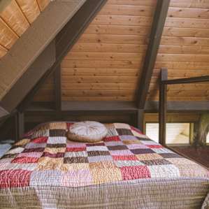 Each cottage also has a loft up top with a mattress
