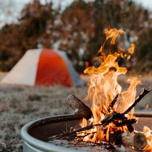 Warming up by the fire.
