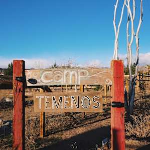 The Camp Temenos sign when you first enter.