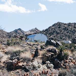 Views of the mountains and property behind the site