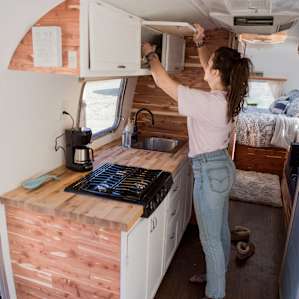The airstream is equipped with cooking supplies and plenty of dish ware
